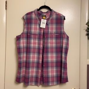 Sleeveless collared shirt.